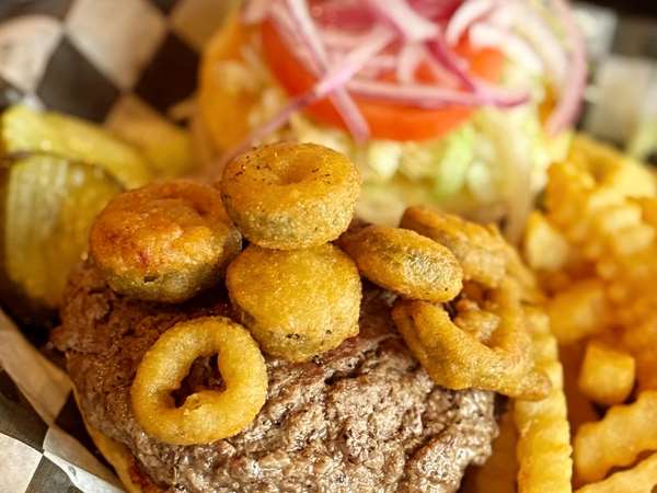 burger topped with jalapenos